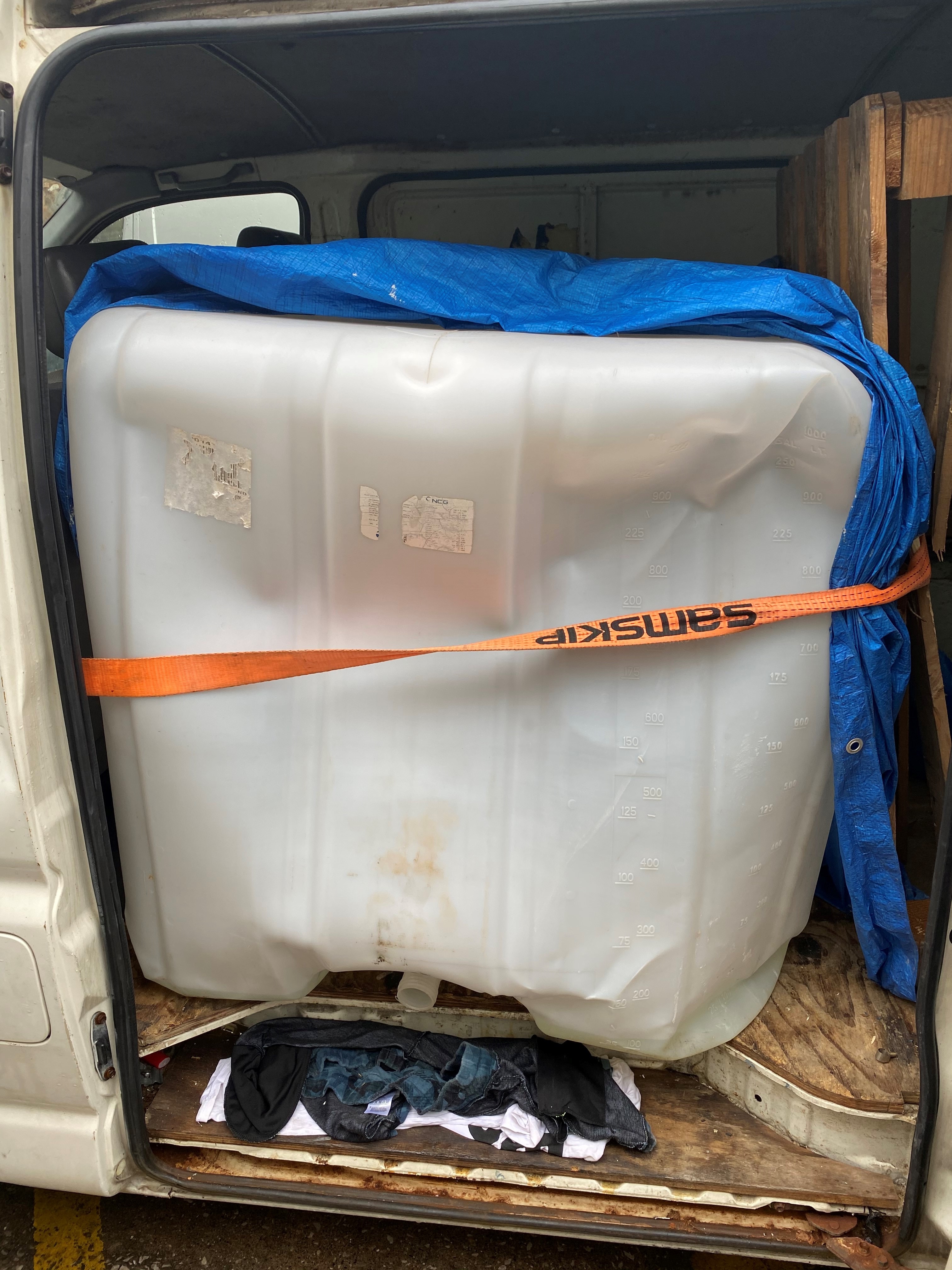 1000 litre fuel container located within the rear of the Toyota Hi-Ace van